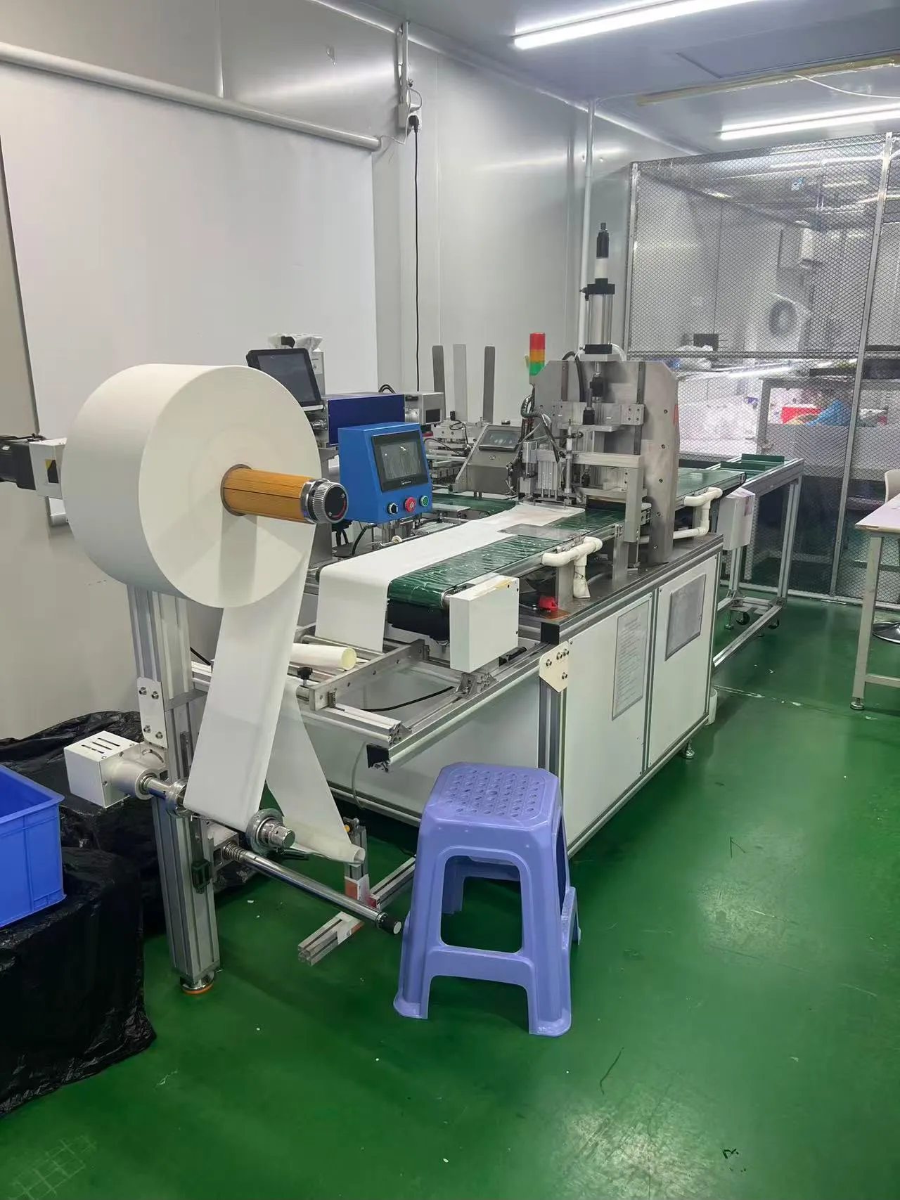 Roll material feeding into production equipment