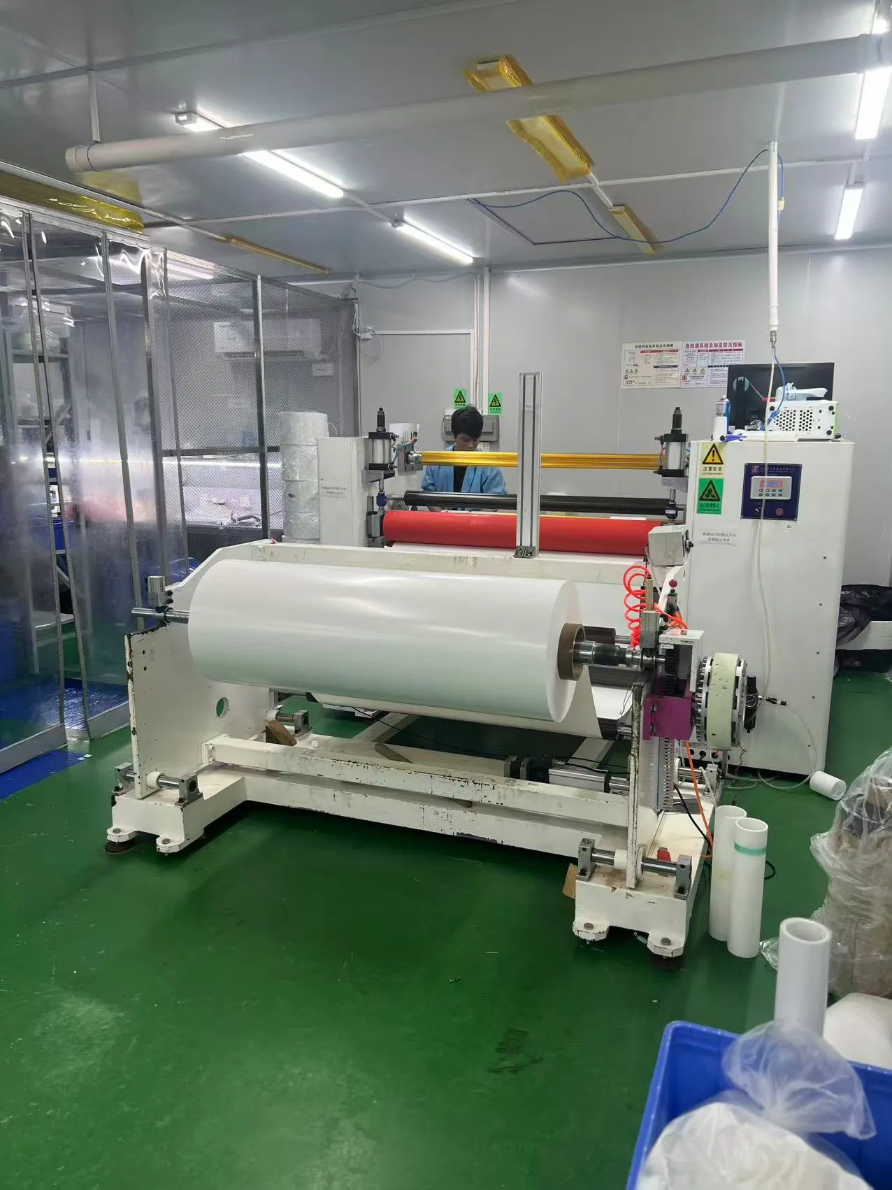 Large material roll on factory equipment