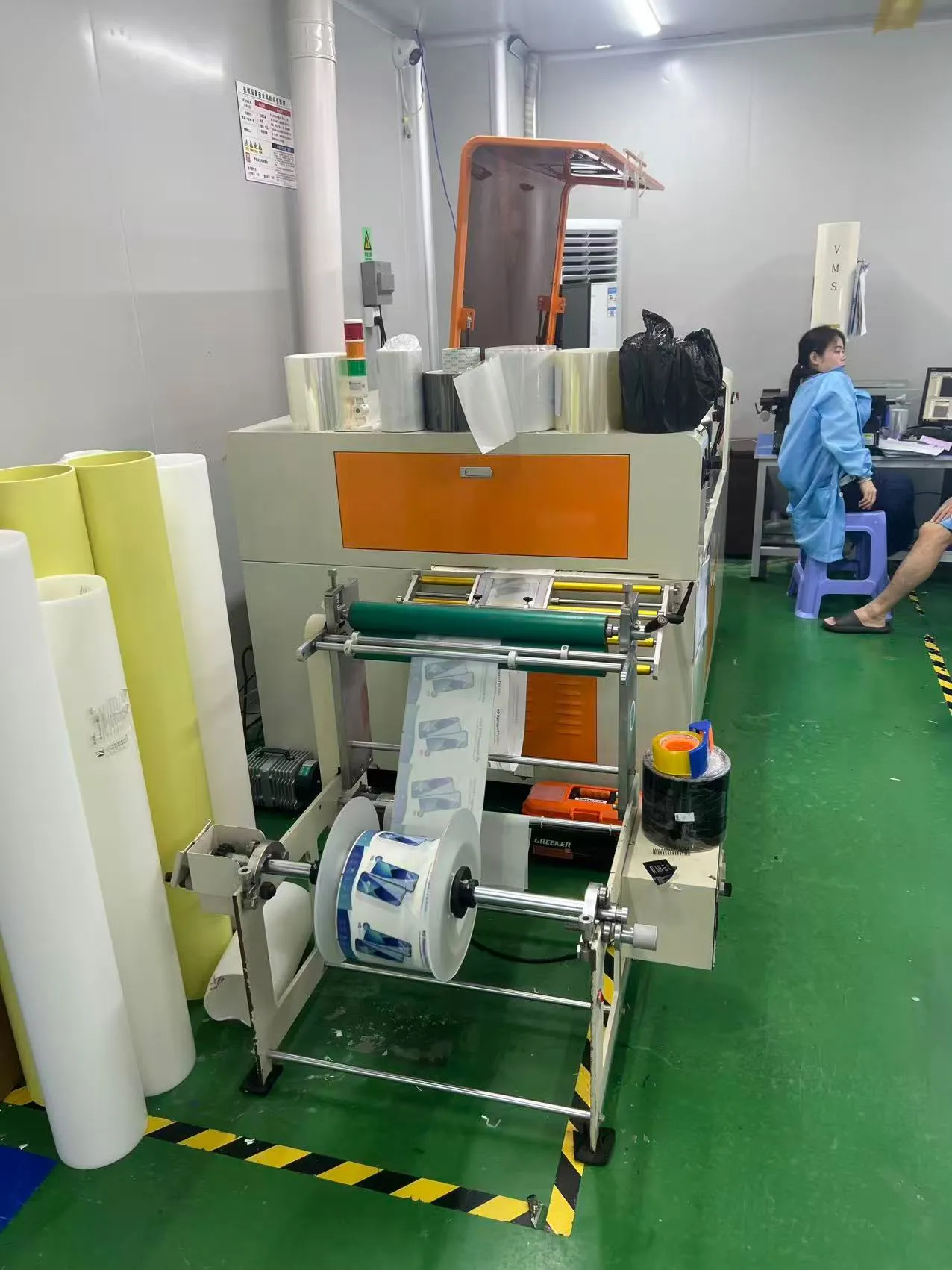 Roll-fed film processing station