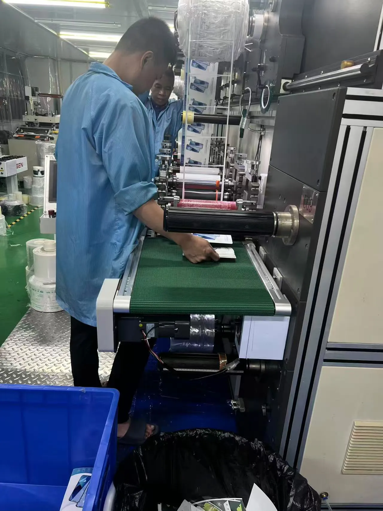Team member operating machinery on the production line